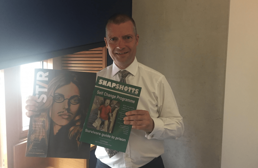 Graham outside the prison and with the magazines