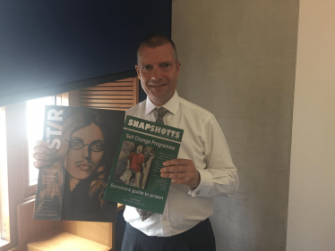 Graham outside the prison and with the magazines